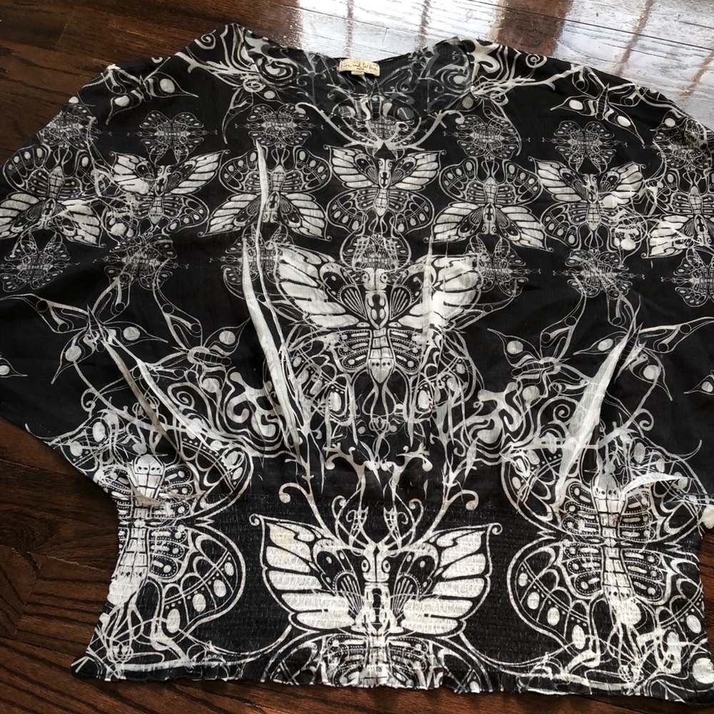 Live and Let Live batwing top